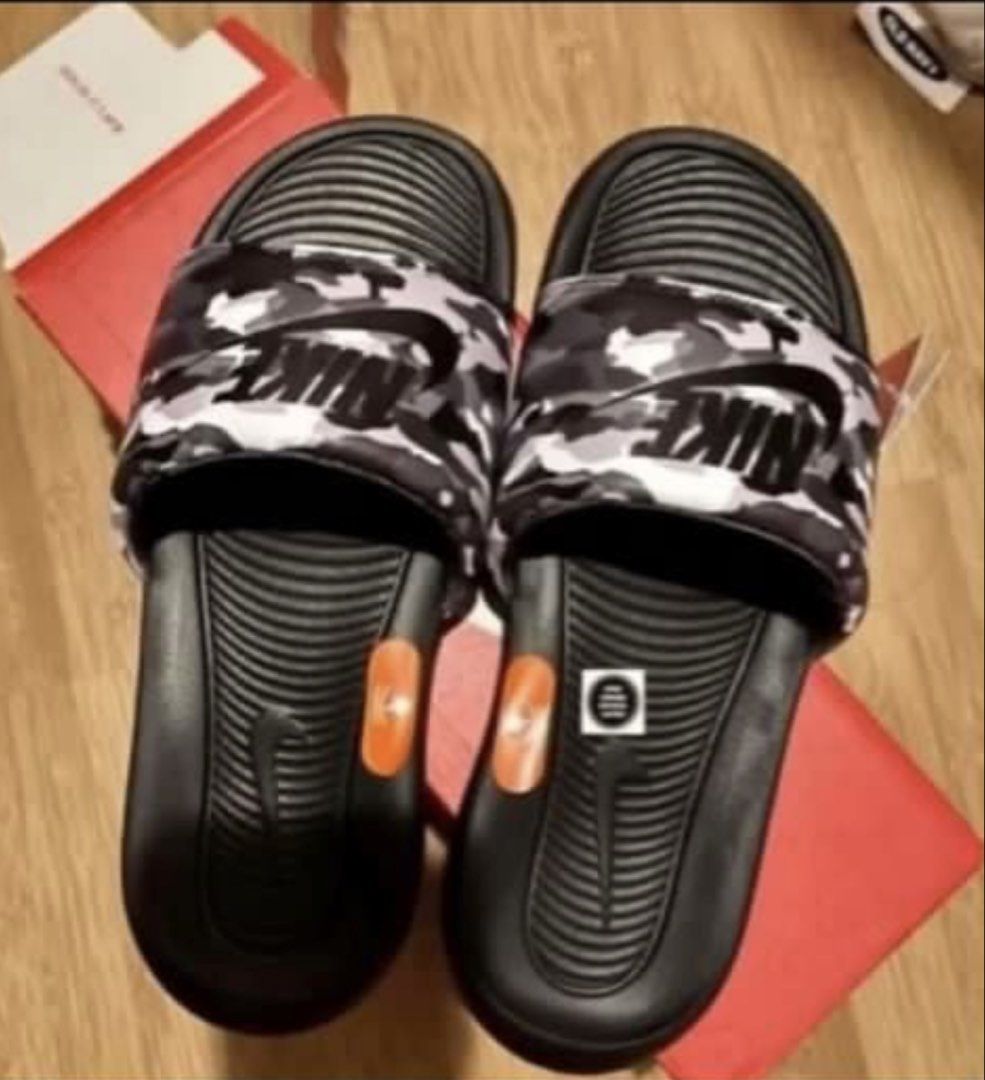 Nike slides (Category: Slippers & Slides) located in Pasay City. Submitted by taptooload (Listing ID 1450891772, Image 2). Description: A classic slide that’s made with versatile wearing in mind, the Nike Men’s Victori One All-Over Print Slide Sandals are essential for your on-the-go lifestyle. Contoured foam adds total comfort, while all-over print graphics on the band gives these sandals a dash of streetwear style. Product Features Ultra-soft f