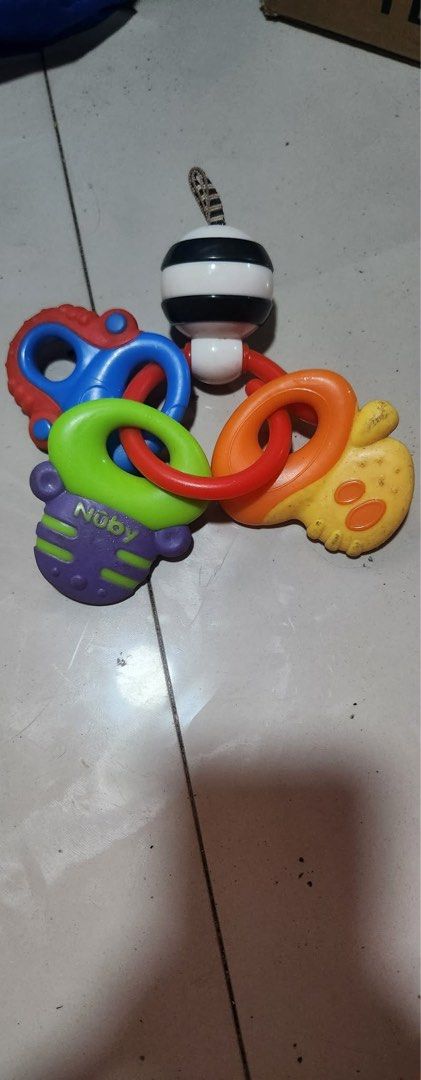Nuby Fun Keys Teether Ring (Category: Infant Playtime) located in Manila. Submitted by carlance (Listing ID 1450815730, Image 2). Description: - Nuby Fun Keys Teether Ring - still in good condition - big discount instead of getting a new one .