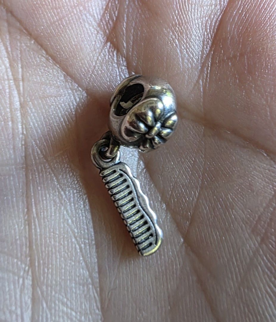Pandora Comb Charm (Category: Charms) located in Mandaluyong City. Submitted by mlstuff28 (Listing ID 1450909993, Image 1). Description: -Authentic -Sterling silver Mop:bank transfer/gcash.