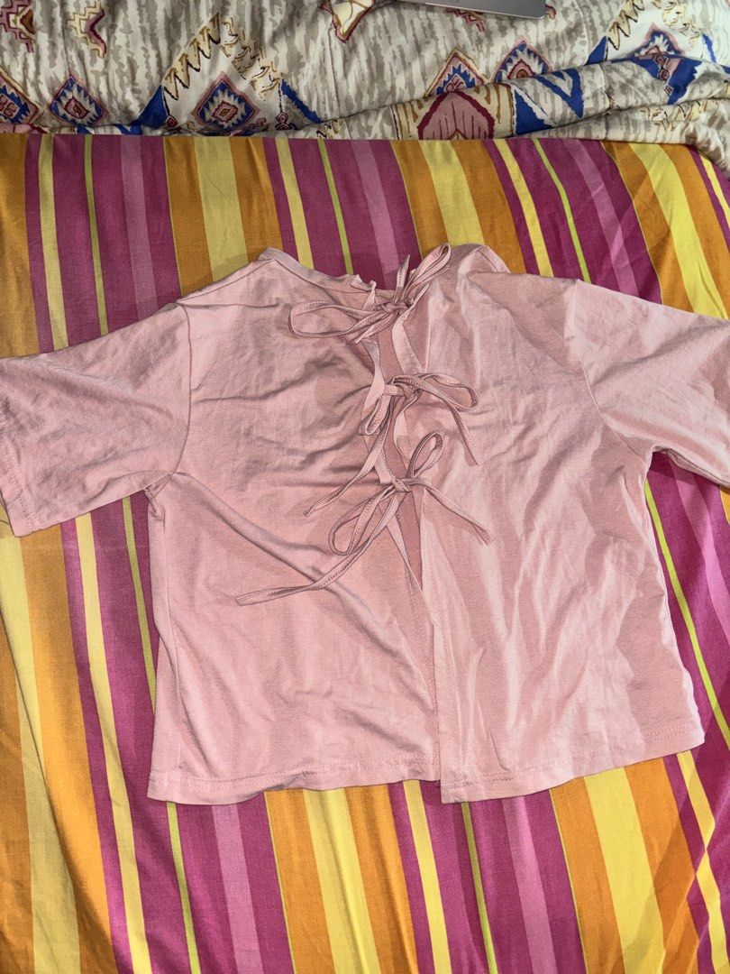 Pink Ties top (Category: Sleeveless) located in Manila. Submitted by misapreloved (Listing ID 1450909076, Image 1). Description: .