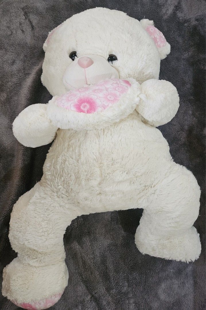 Plush Stuffed Toy - WHITE BEAR W/ HEART (Category: Plushies & Soft Toys) located in Quezon City. Submitted by al1en_rob0t (Listing ID 1450855848, Image 2). Description: PRICE: ₱1000 EACH How to Order: Please message me with the item number you want to purchase or a screenshot of the item. AVAILABILITY STATUS: 1. White Heart Bear - [ AVAILABLE ] Details: • Condition: discoloration- whitish nose instead of pink • Size: seated 17 inches, standing 29