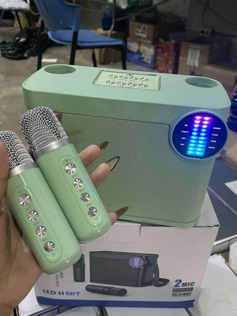 Portable Bluetooth Speaker with 2 Wireless Microphones (Category: Soundbars, Speakers & Amplifiers) located in Manila. Submitted by yongyongse72148 (Listing ID 1450913789, Image 2). Description: Portable karaoke speaker with 2 wireless mics. Bluetooth enabled. Available in black, mint green, white, pink. Includes all accessories..