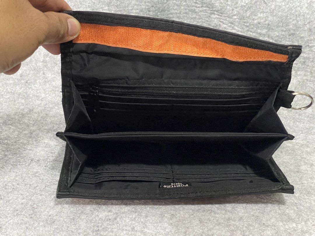 porter long wallet (Category: Belt bags, Clutches and Pouches) located in Calamba. Submitted by thriftingoverload (Listing ID 1450865351, Image 3). Description: plus shipping fee .