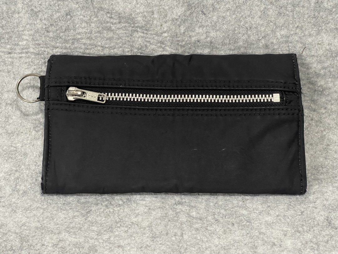 porter long wallet (Category: Belt bags, Clutches and Pouches) located in Calamba. Submitted by thriftingoverload (Listing ID 1450865351, Image 2). Description: plus shipping fee .