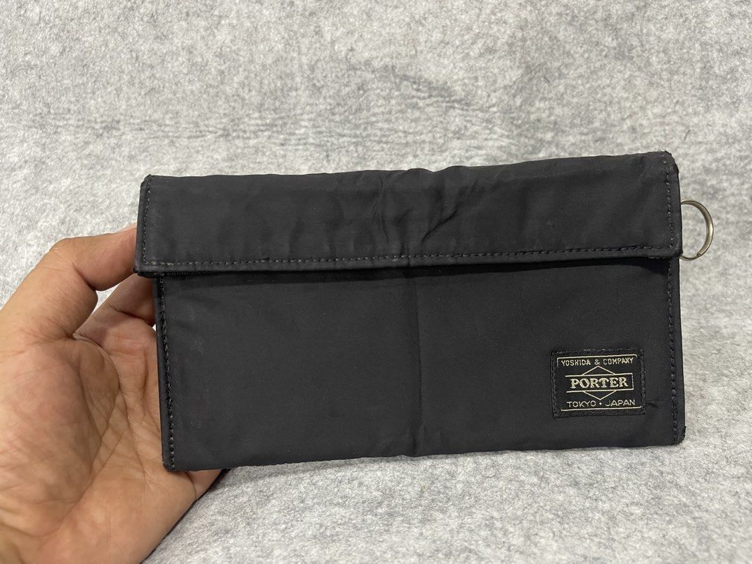 porter long wallet (Category: Belt bags, Clutches and Pouches) located in Calamba. Submitted by thriftingoverload (Listing ID 1450865351, Image 1). Description: plus shipping fee .