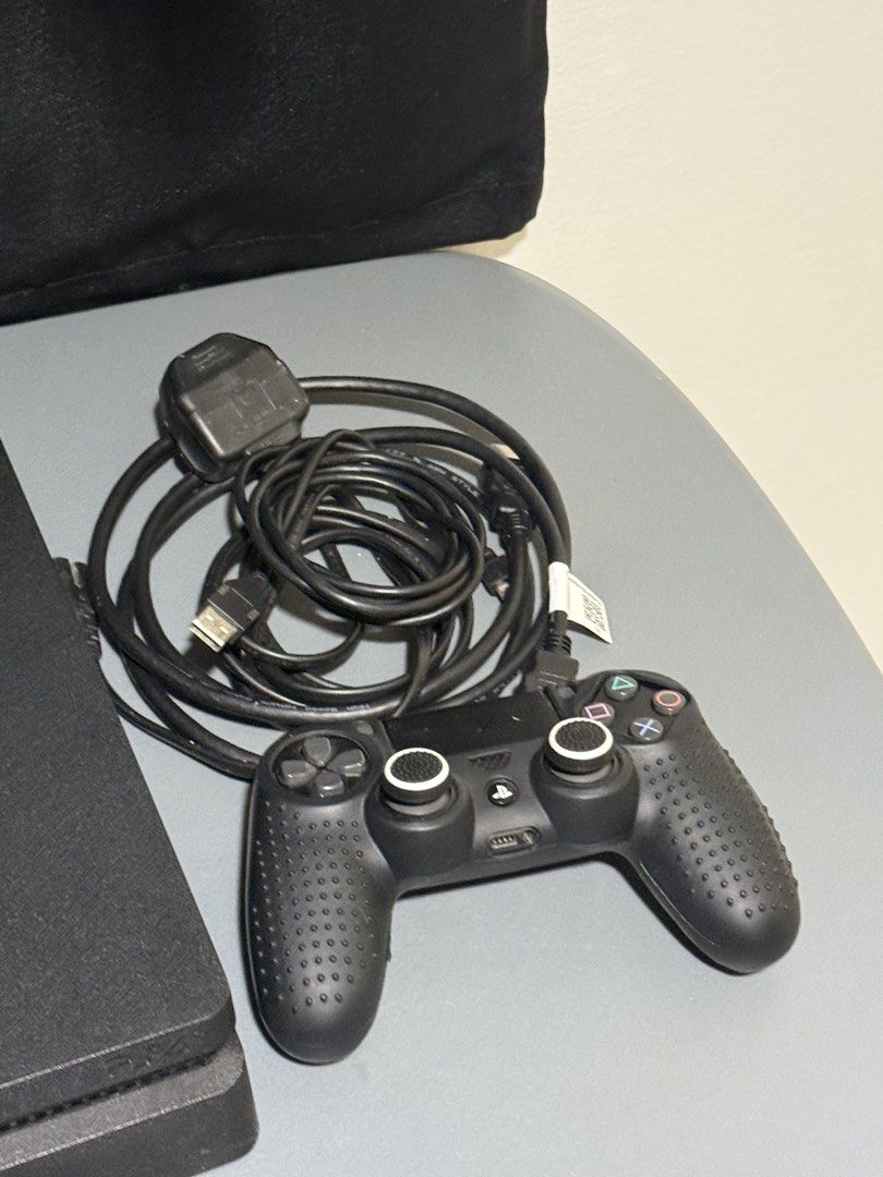 PS4 SLIM 500G With 1 Original Controller & 2 Disc Games (Category: PlayStation) located in Quezon City. Submitted by senmaxxing (Listing ID 1450750633, Image 3). Description: Price: 7999 Only Fixed! 1 Unit available- Actual pics posted Lowballers will be ignored No box pero Makinis & Intact Seal Never nabuksan / pwede pang regalo PS4 Slim 500Gb System 12.52 Jailbreakable Comes with Original Power cord & HDMI 1 Original Controller 2 Disc Games GTA
