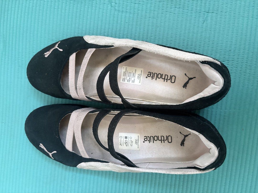 Puma Black & Pink Ballet Flats with Straps (Category: Flats & Sandals) located in Paranaque City. Submitted by emceerious (Listing ID 1450761628, Image 1). Description: - US W - 8.5 - Puma ballet flats in black - Features pink elastic straps - Equipped with Ortholite insoles for superior comfort - Soles offer excellent grip - Perfect for casual everyday wear - Shows minor signs of wear on the soles, but remains in good overall condition.