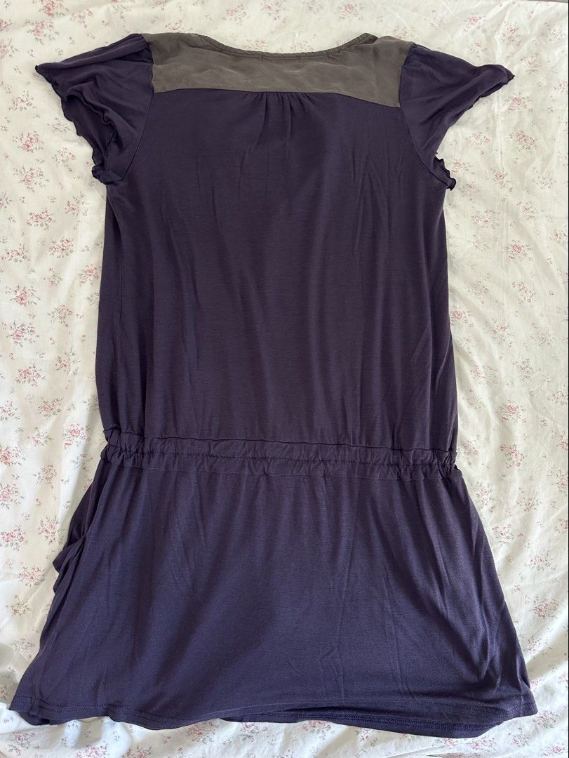 Purple Dress with Grey Panel Detail (Category: Dresses) located in Mandaluyong City. Submitted by slickestb (Listing ID 1450786833, Image 3). Description: - Purpledress with a contrasting grey panel down the front. - Short sleeves with cute ruffled edges. - Comfortable elasticated in waist with a gathered skirt. - Perfect for a relaxed, everyday look. - Paloma Wool Inspired - Small to medium.