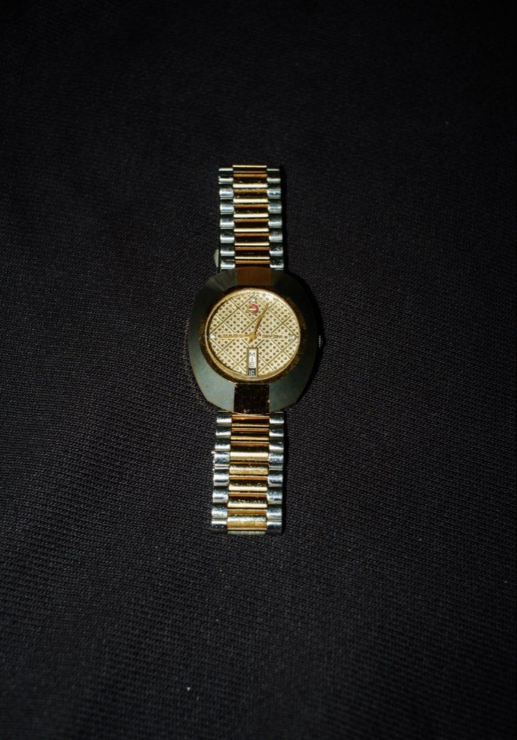 Rado Diastar (Category: Luxury Watches) located in Caloocan City. Submitted by dreyko10 (Listing ID 1450759055, Image 1). Description: - Authentic Rado watch - Two-tone stainless steel band with elegant gold accents - Distinctive oval face with a textured dial - Convenient date window located at 3 o'clock - Secure and reliable clasp .