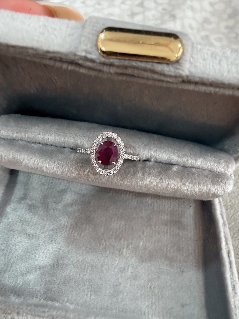 Ruby Diamond Ring (Category: Rings) located in Singapore. Submitted by Tenasious (Listing ID 1450840908, Image 2). Description: This Unique piece is a definite stunner, the masterfull combination of Ruby and unique placement of the Diamond to surround the Ruby Ruby Diamond Ring Natural Ruby 0.86 carat Natural Diamond 0.28 carat with PT900 hallmark 3.28 grams US5.5/ HK 12 A showstopping Ring! Local certification & Repolishing can be arranged withi