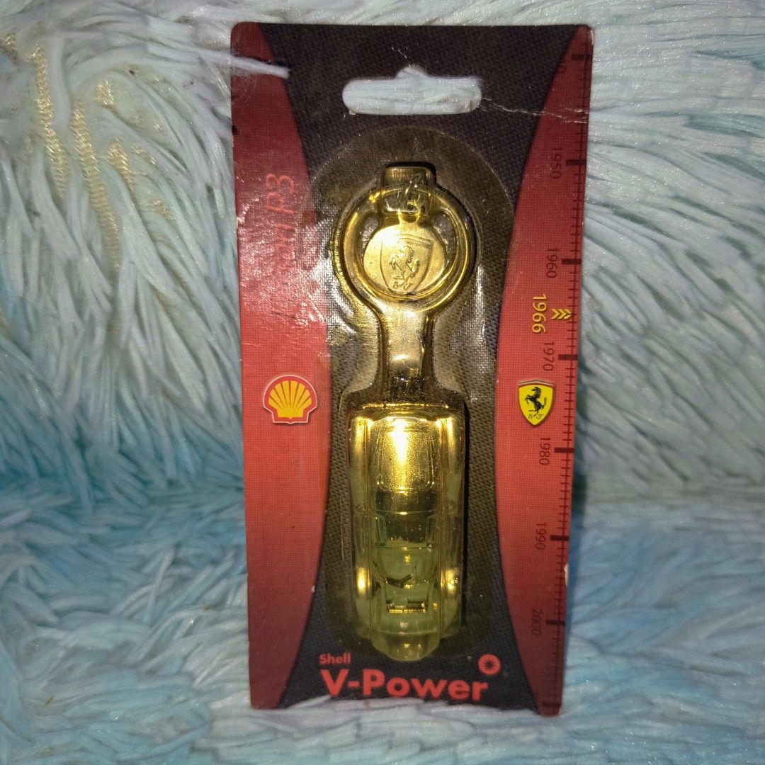 Shell V-Power Ferrari Car Keychains (Category: Vehicle & Diecast Models) located in Quezon City. Submitted by littlecavzshop (Listing ID 1450902226, Image 2). Description: - Shell V-Power Ferrari car keychains - Each keychain features a different iconic Ferrari model - Comes in original, unopened packaging - Ideal for car enthusiasts, collectors, or as a unique gift.