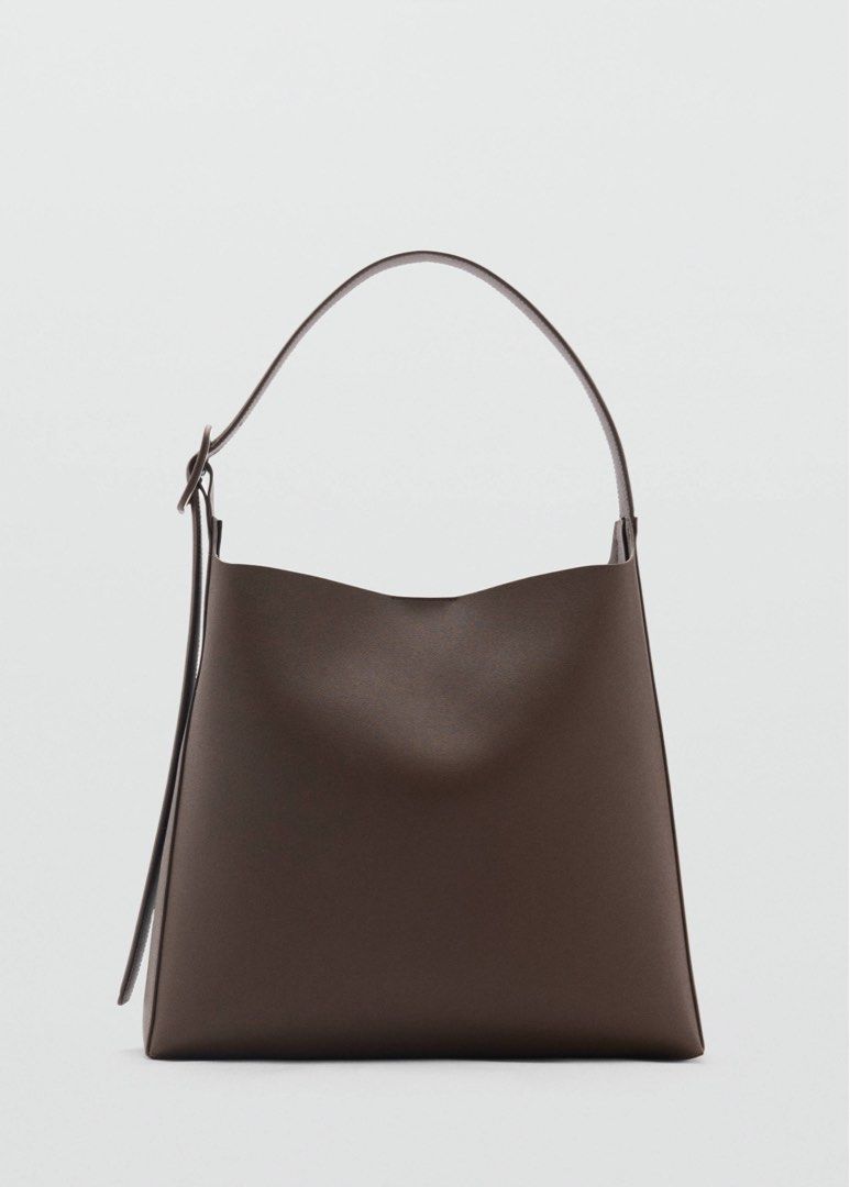 SHOPPER BAG WITH BUCKLE (Category: Shoulder Bags) located in Quezon. Submitted by achicoco (Listing ID 1450885636, Image 1). Description: Adjustable short handle. Large. Shopper style. Adjustable and detachable long strap. Inner zipped pocket. Inside magnet fastening. Adjustable buckle. Inner lining. Office looks. Decorative buckle. Medium. Shoulder strap. Adjustable strap. Magnetic button closure. Inside bag. Zip fastening 35.0x32.0x13.0 cm (Len