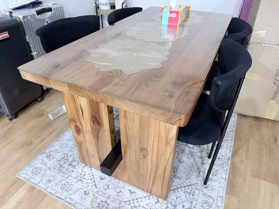 Solid Wood Dining Table (Category: Tables & Sets) located in Singapore. Submitted by ds_drop (Listing ID 1450878233, Image 2). Description: - Solid wood dining table - Thick, sturdy tabletop - Robust block legs - Seats 6 people comfortably - Natural wood grain finish - Ideal for family dinners and gatherings Need to clear asap as we are moving house. Can throw in the 4 chairs if buyer wants. Kindly arrange your own transport/movers as the table i
