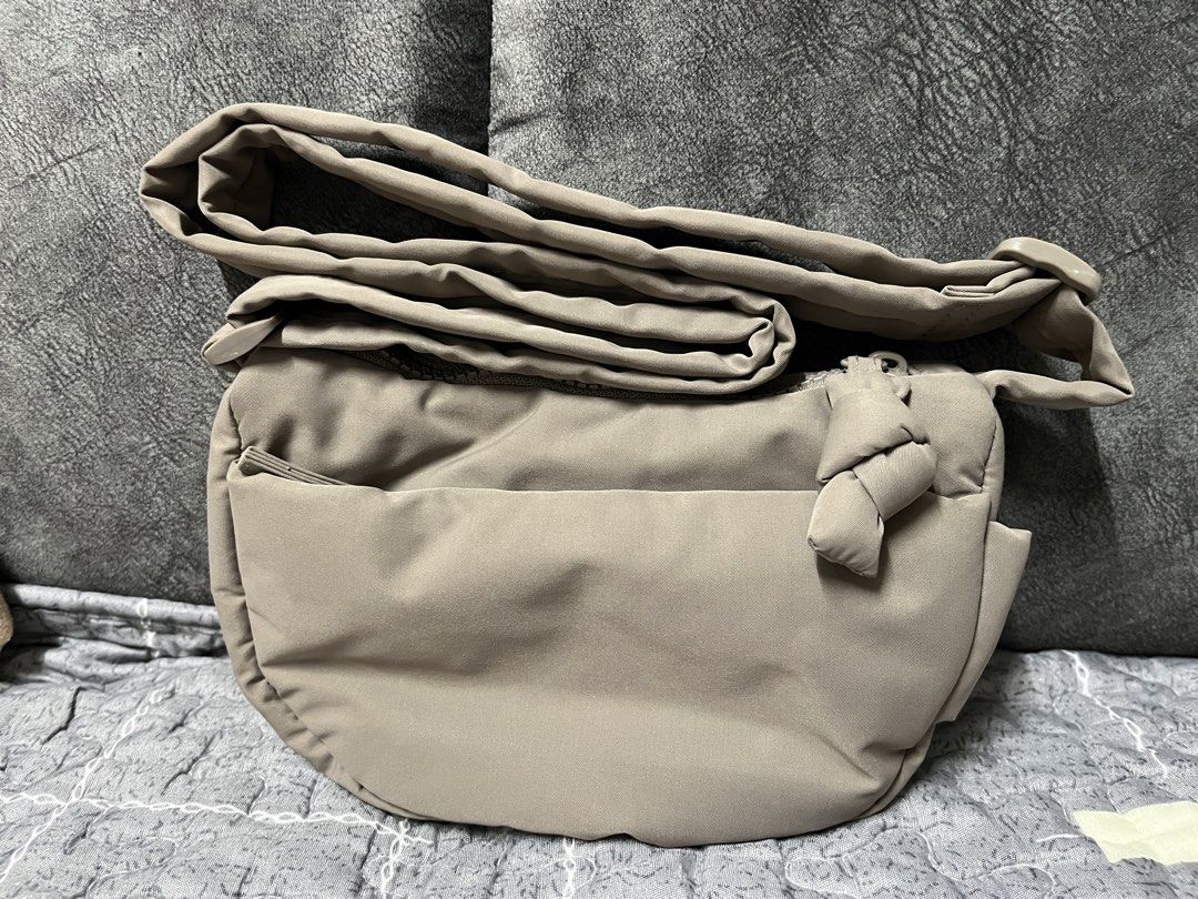 Sometime Soffa Micro Hobo Bag (Category: Cross-body Bags) located in Klang. Submitted by klivni (Listing ID 1450849910, Image 1). Description: - Brand: Sometime - Color: Khaki - Material: Nylon - Features: Main zip compartment, outer pocket - Strap: Adjustable with knot detail - Care: Easy to clean with wet wipes - Ideal for: Everyday use.