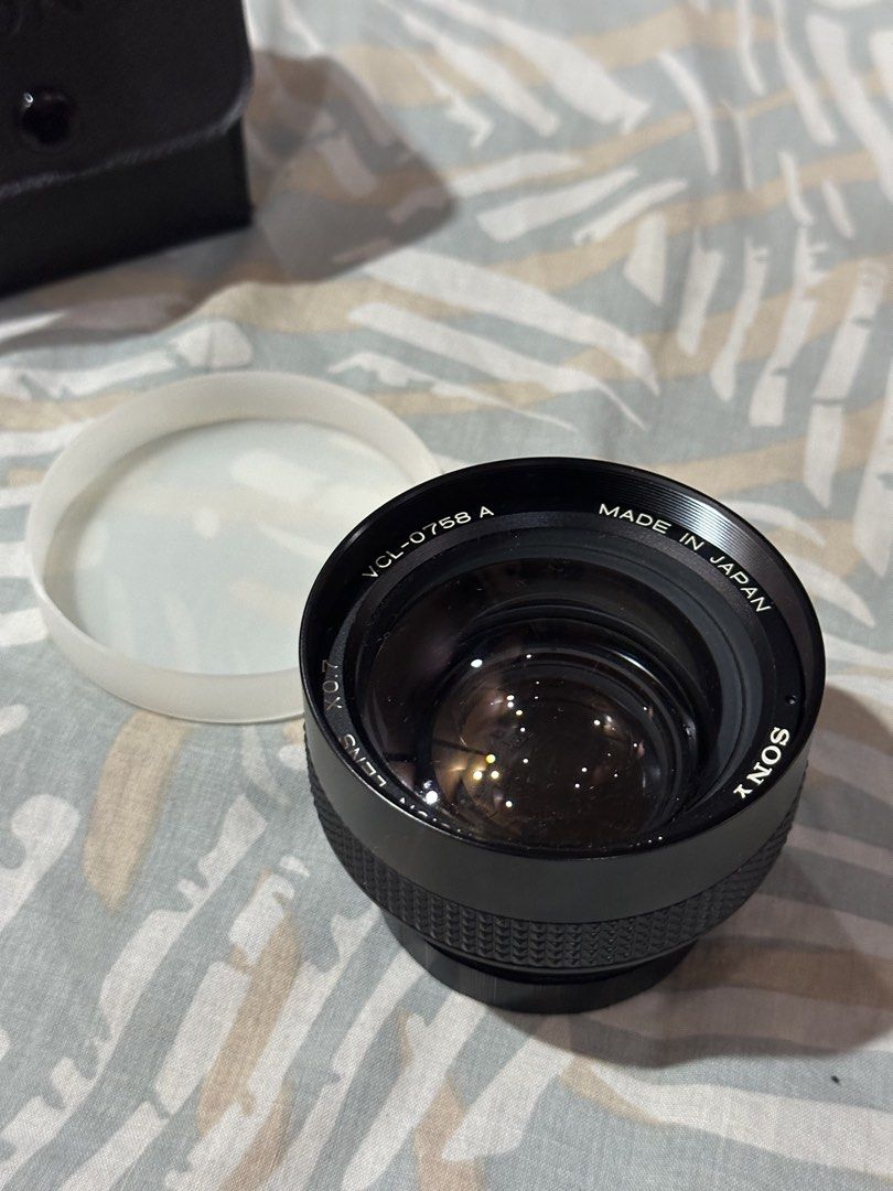 Sony VCL-0758A Wide Conversion Lens (Category: Lens & Kits) located in Manila. Submitted by janrieroci85024 (Listing ID 1450874644, Image 1). Description: - Kept in dry box - Includes original Sony leather case - Includes original lens cap - Includes original Box and Manual - Includes a Kenko 46-58 Adapter Ring - Optics appear clear during normal inspection, but due to the item’s age, please refer to the detailed photo and manage expectations Nev