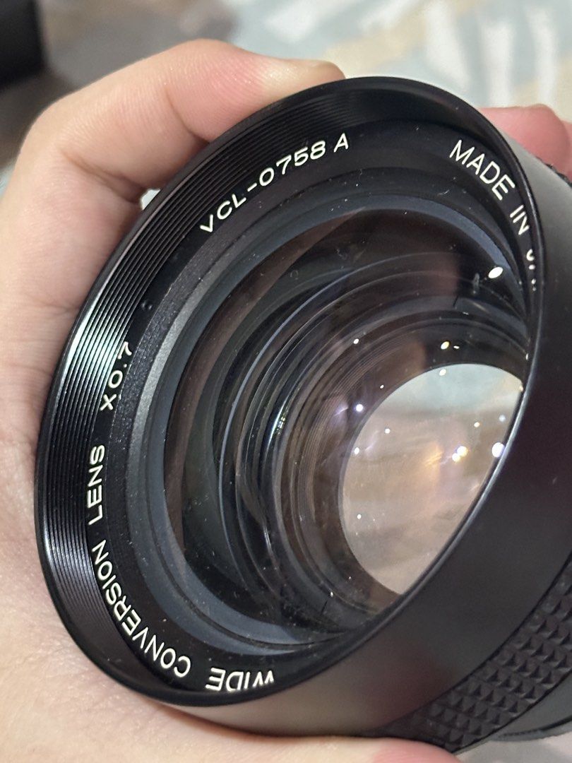 Sony VCL-0758A Wide Conversion Lens (Category: Lens & Kits) located in Manila. Submitted by janrieroci85024 (Listing ID 1450874644, Image 3). Description: - Kept in dry box - Includes original Sony leather case - Includes original lens cap - Includes original Box and Manual - Includes a Kenko 46-58 Adapter Ring - Optics appear clear during normal inspection, but due to the item’s age, please refer to the detailed photo and manage expectations Nev