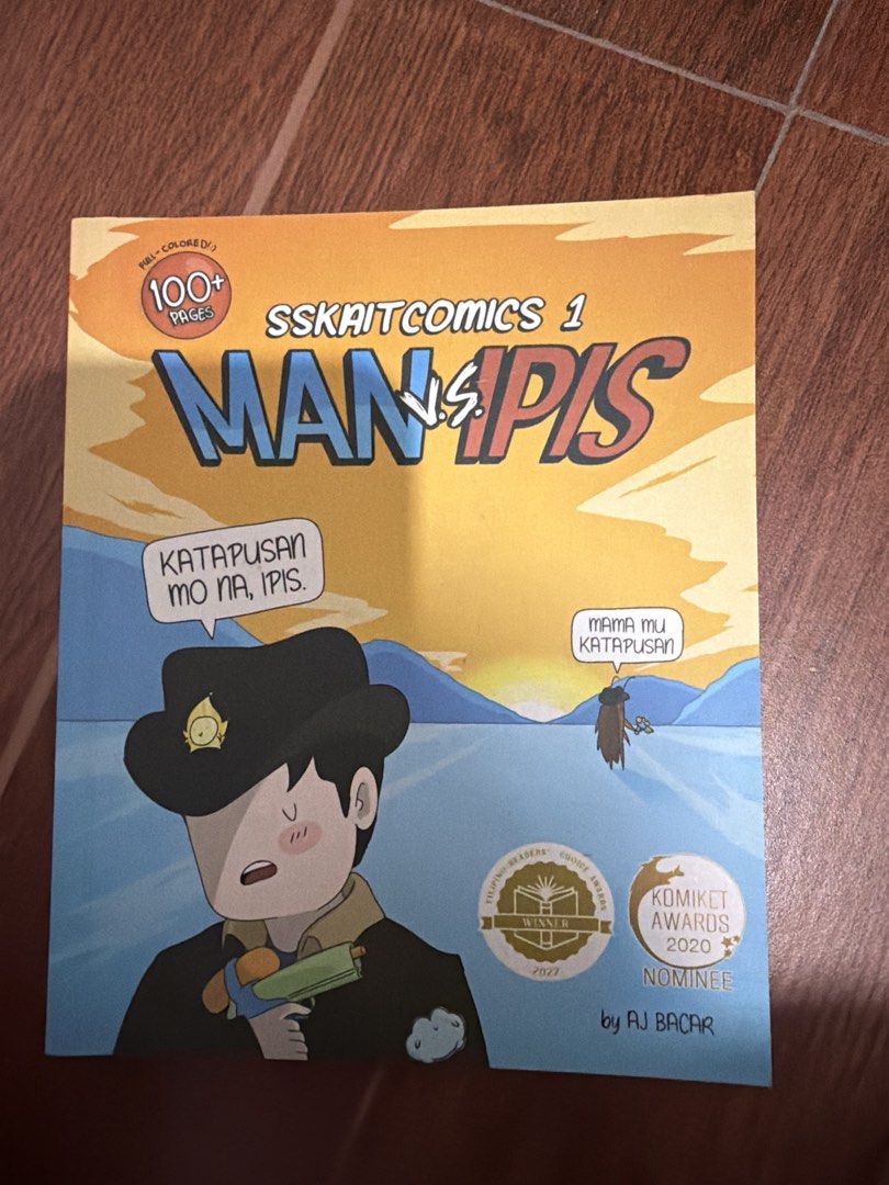 SSKAIT COMICS 1: MAN VS IPIS by PJ Badar (Category: Comics & Manga) located in Mandaluyong City. Submitted by stuff_coollection (Listing ID 1450873680, Image 1). Description: - Viral online comic 'Man vs Ipis' now available in full book form! - Features a courageous man battling the most savage cockroaches. - Experience heartbreaking, pain-inflicting real talks and striking truths. - Over 100 pages of intense content. - Komiket Awards 2020 Nomine