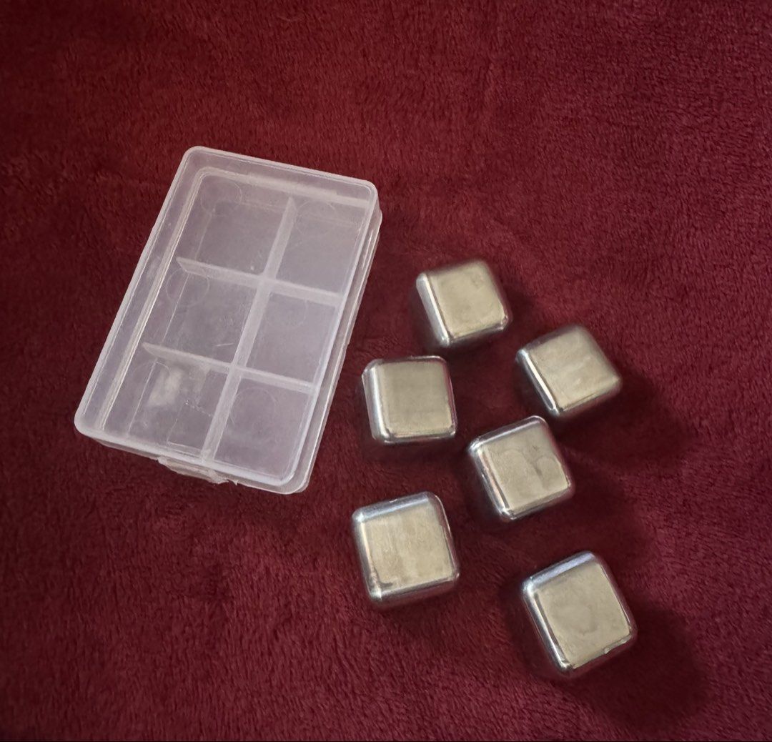 Stainless Steel Reusable Whiskey Ice Cubes with Case (Category: Other Kitchenware & Tableware) located in La Trinidad. Submitted by whatnotcollections (Listing ID 1450838508, Image 2). Description: - Set of 6 stainless steel whiskey stones - Keeps drinks cold without dilution - Made from food-grade stainless steel - Includes a handy storage case - Simply freeze and use - Ideal for whiskey, cocktails, and any chilled beverage - Easy to clean and r