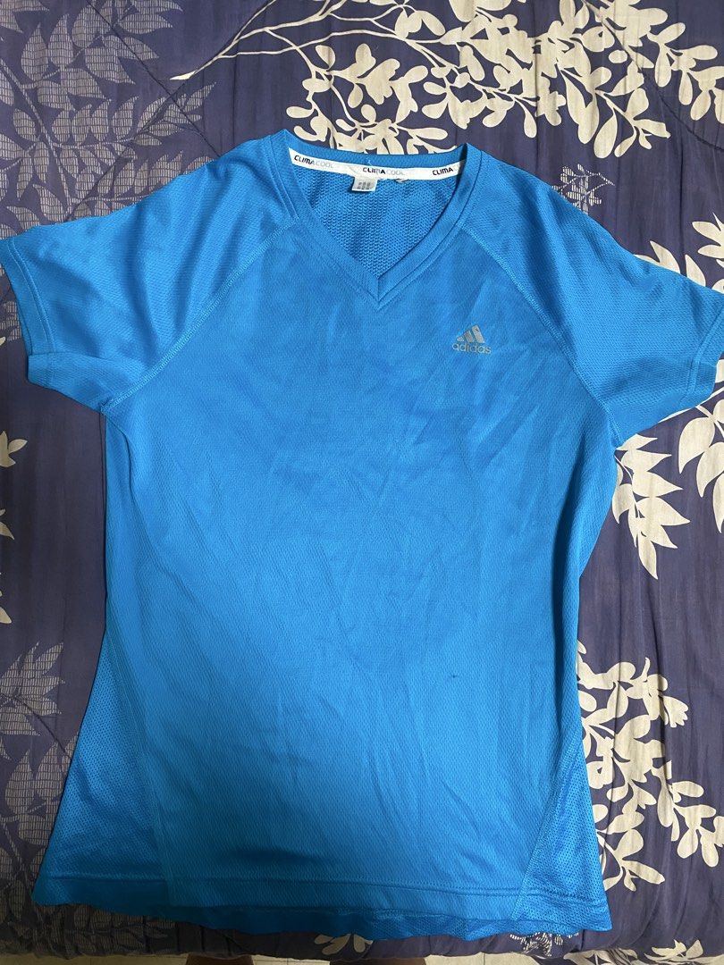 Teal sports shirt (Category: Activewear) located in Makati City. Submitted by s_mimi (Listing ID 1450754648, Image 1). Description: Fits small to medium.