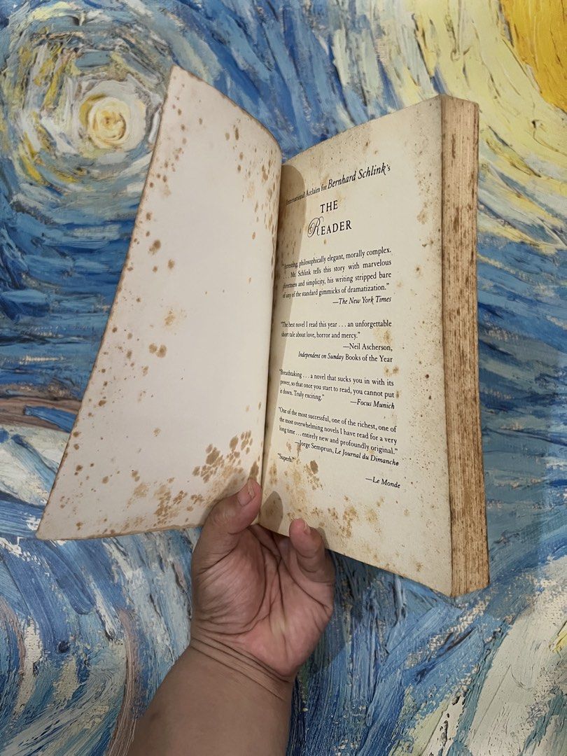 “The Reader” Book (Category: Storybooks) located in Quezon City. Submitted by katchierandomness (Listing ID 1450884363, Image 3). Description: Pages have yellowed, and cover has stains. Book is in good condition. You can pay via GCash, Maya or BPI QR code..