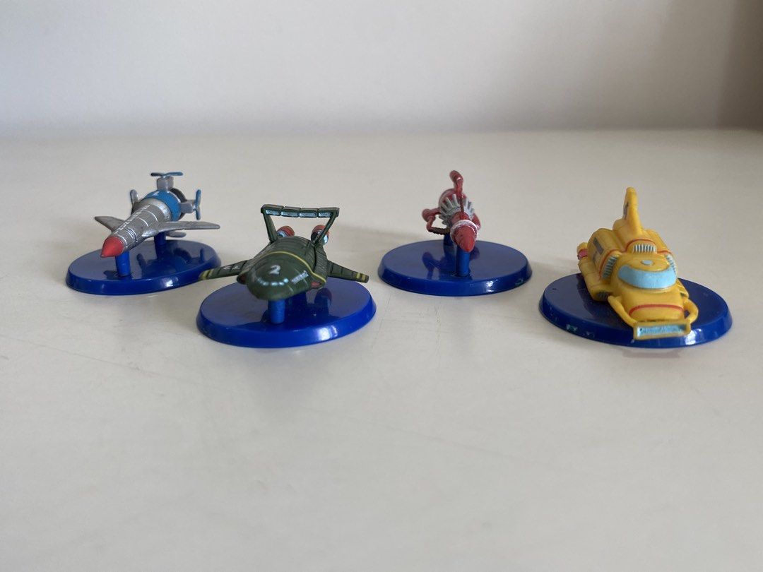 Thunderbirds miniature set (4 pieces) (Category: Vehicle & Diecast Models) located in Santa Rosa. Submitted by toysandusbmg (Listing ID 1450923123, Image 2). Description: Thunderbirds miniature set (4 pieces) ~ Preowned items From Japan. - Good for collector or display item - Sold as set.