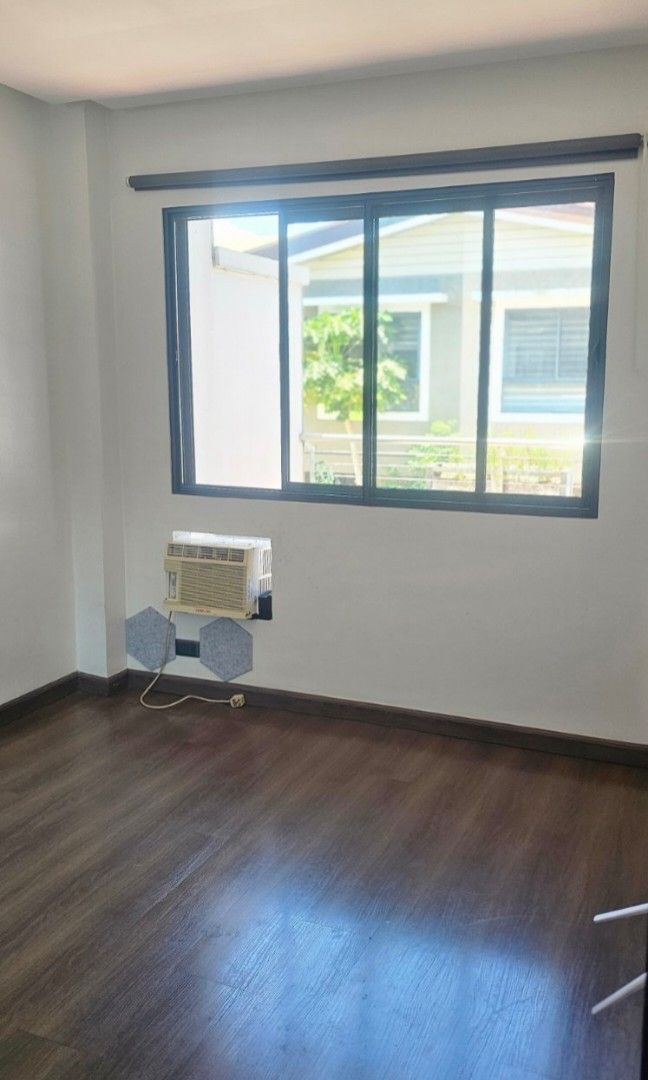 Townhouse for rent (Category: Townhouse) located in Paranaque City. Submitted by mariacarina2020 (Listing ID 1450825079, Image 2). Description: Woodsville residences at west service road Merville Parañaque city. Lot area 73sqm.floor area 123sqm.2storeys.3bedrooms with balcony,semi furnished, with maidsroom and balcony.1 car garage. Gated subdivision with amenities like swimming pool and gym with kids play ground.Asking at 45k inclusive of dues.