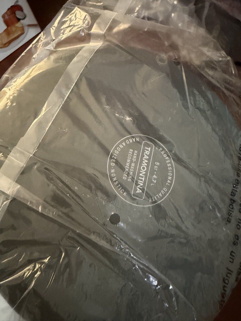 Tramontina Professional Non-Stick Deep Cookware (Category: Cookware & Accessories) located in Quezon City. Submitted by circeaiaia (Listing ID 1450807761, Image 2). Description: - Tramontina Professional Frying Pan - Hard anodized non-stick surface - 5.5qt capacity (approx. 4.7L) - Hand washing recommended for longevity - Perfect for everyday cooking - Brand new, still in original packaging.