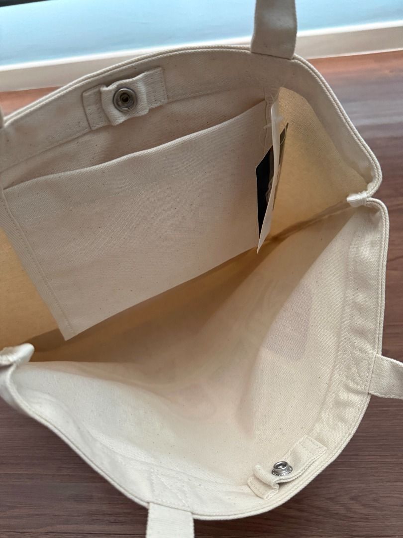 Uniqlo x StarWars Tote Bag - Off White (W40cm x H40cm) (Category: Tote Bags) located in Shah Alam. Submitted by tt_bozu (Listing ID 1450792286, Image 3). Description: Price is FINAL and NON-NEGOTIABLE (No further discount / bundle discount). The tote bag is authentic, new and never used. Bought in Japan. Shipping fee is not included. Shipping fee: RM7 (WM), RM13 (EM) --- Dimension (approximately): 40cm (W) x 40cm (H) x 13cm (Depth) 100% Cotton --