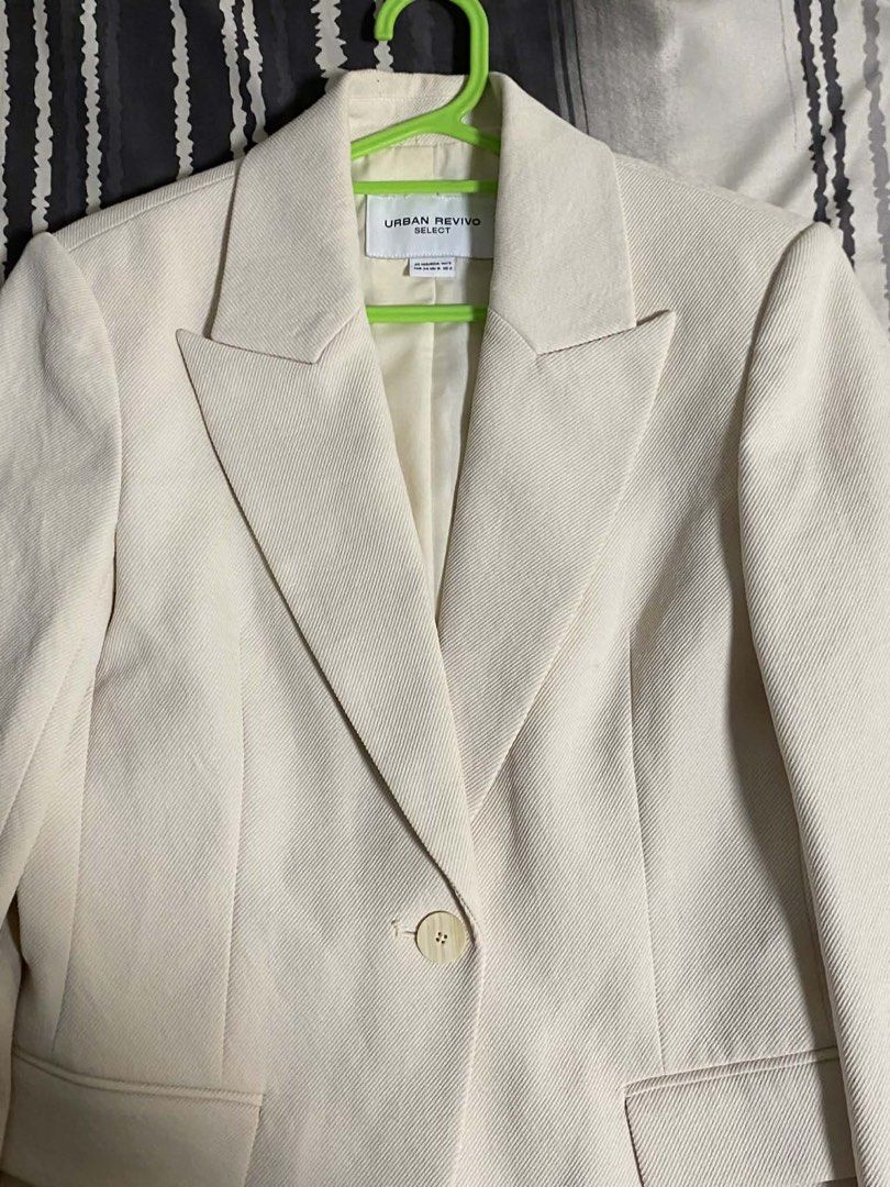 URBAN REVIVO SELECT Cream Blazer (Category: Coats, Jackets and Outerwear) located in Manila. Submitted by chvnsells (Listing ID 1450894001, Image 2). Description: - Cream-colored blazer from Urban Revivo Select - Classic fit with single button closure - Features a lapel collar and two front pockets - Highly versatile for dressing up or down - A wardrobe essential for any occasion.