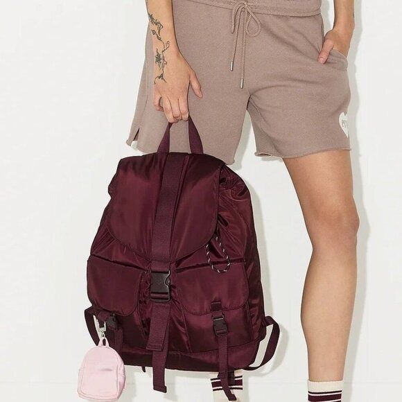 VICTORIA'S SECRET PINK Utility Backpack (Category: Backpacks) located in Caloocan City. Submitted by silentbear_864e19 (Listing ID 1450914752, Image 2). Description: - Authentic Victoria's Secret Pink Backpack - Deep maroon color - Multiple front pockets with buckle closures - Main compartment with buckle closure - Ideal for everyday use or travel.