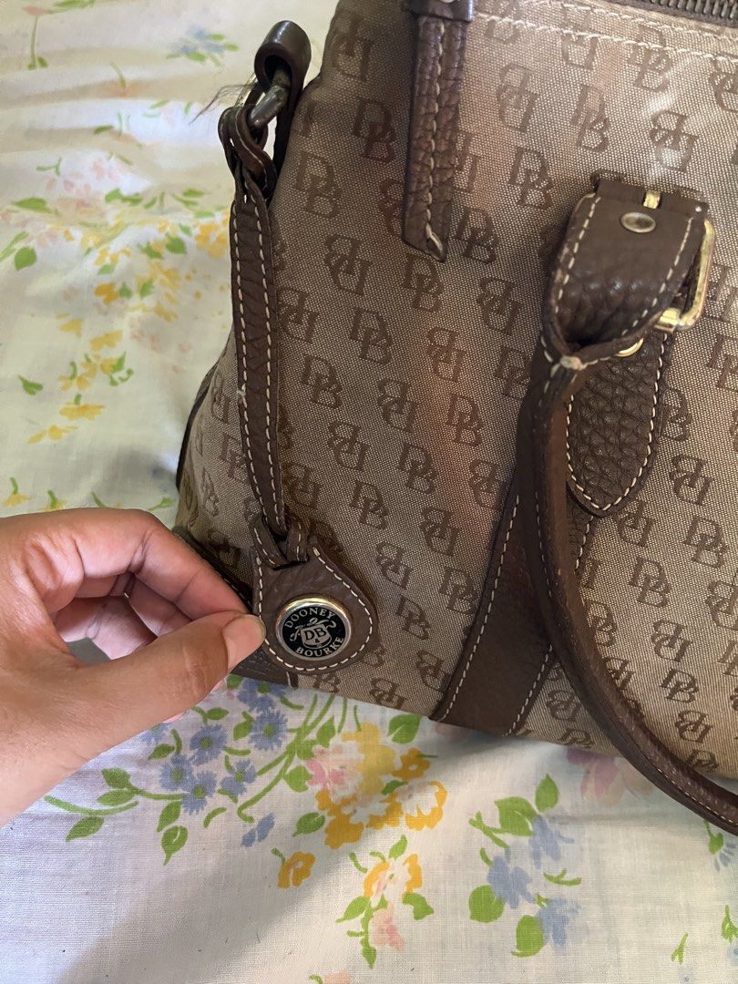 Vintage Dooney & Bourke Canvas SatchelBag (Category: Luxury Bags & Wallets) located in Vintar. Submitted by layla.ly (Listing ID 1450745481, Image 3). Description: RFS: NEED FUNDS - Classic Dooney & Bourke satchel bag - No major issue, just some white spots on the second picture MOP: GCASH/GOTYME MOD: JNT Shipping fee will be shouldered by the buyer .