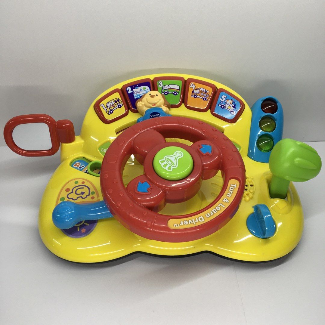 VTech Turn & Learn Driver Toy Steering Wheel (Category: Infant Playtime) located in Quezon City. Submitted by goodz4good (Listing ID 1450794899, Image 1). Description: - VTech Turn & Learn Driver toy - Lots of interactive buttons and sounds - Features a steering wheel, gear shifter, and traffic lights - Encourages motor skill development and learning about vehicles - Batteries not included mode of payment gcash cash or cod meet up available free 