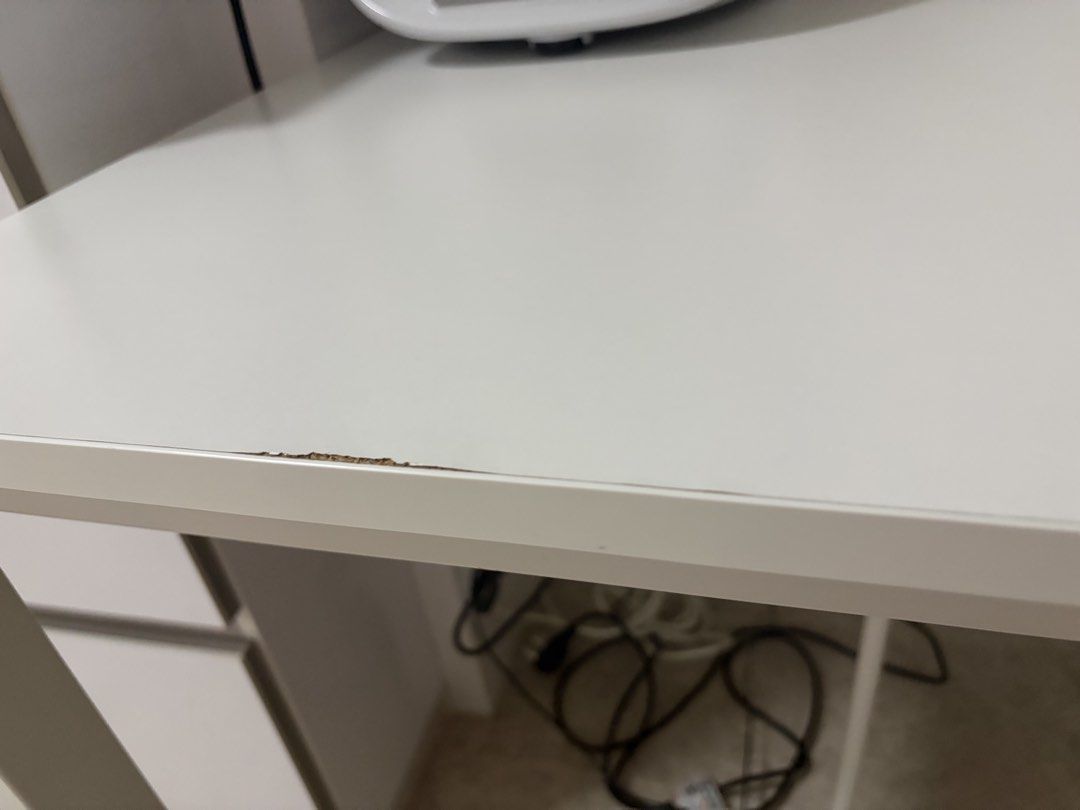 White Rectangular Dining Table (Category: Tables & Sets) located in Singapore. Submitted by tylertohky77465 (Listing ID 1450895087, Image 3). Description: IKEA table - White rectangular table - Versatile: suitable for dining or as a work desk - Features: Sturdy legs, easy-to-clean surface - Reason for selling: Moving house.