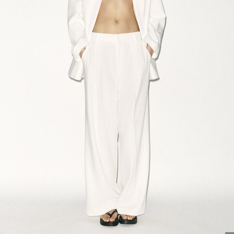 ZARA Darted Trousers - White, Size L (Category: Other Bottoms) located in Quezon City. Submitted by mer.declutters (Listing ID 1450862257, Image 1). Description: High-waisted pants with belt loops. Front pleat detail. Side pockets and false welt pockets in the back. Front zip and button closure. Rfs: need to downsizeeee Purchased from Zara app.