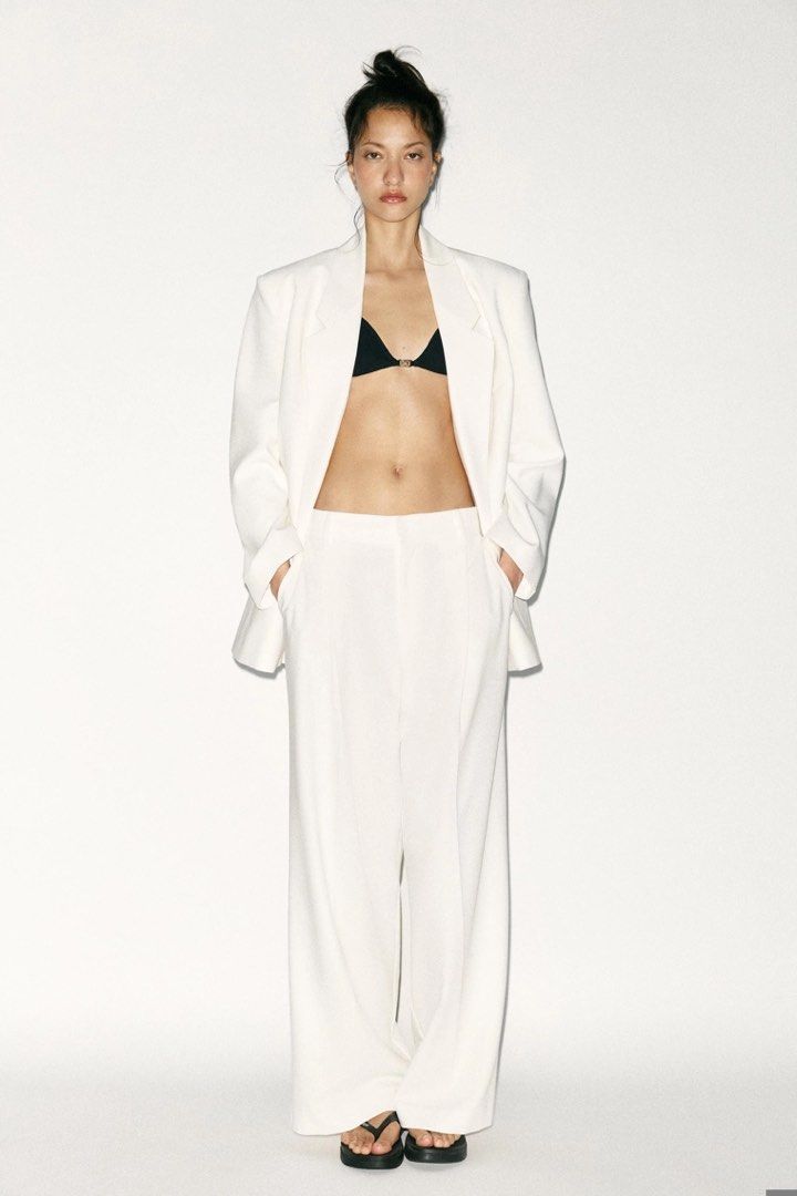 ZARA Darted Trousers - White, Size L (Category: Other Bottoms) located in Quezon City. Submitted by mer.declutters (Listing ID 1450862257, Image 2). Description: High-waisted pants with belt loops. Front pleat detail. Side pockets and false welt pockets in the back. Front zip and button closure. Rfs: need to downsizeeee Purchased from Zara app.