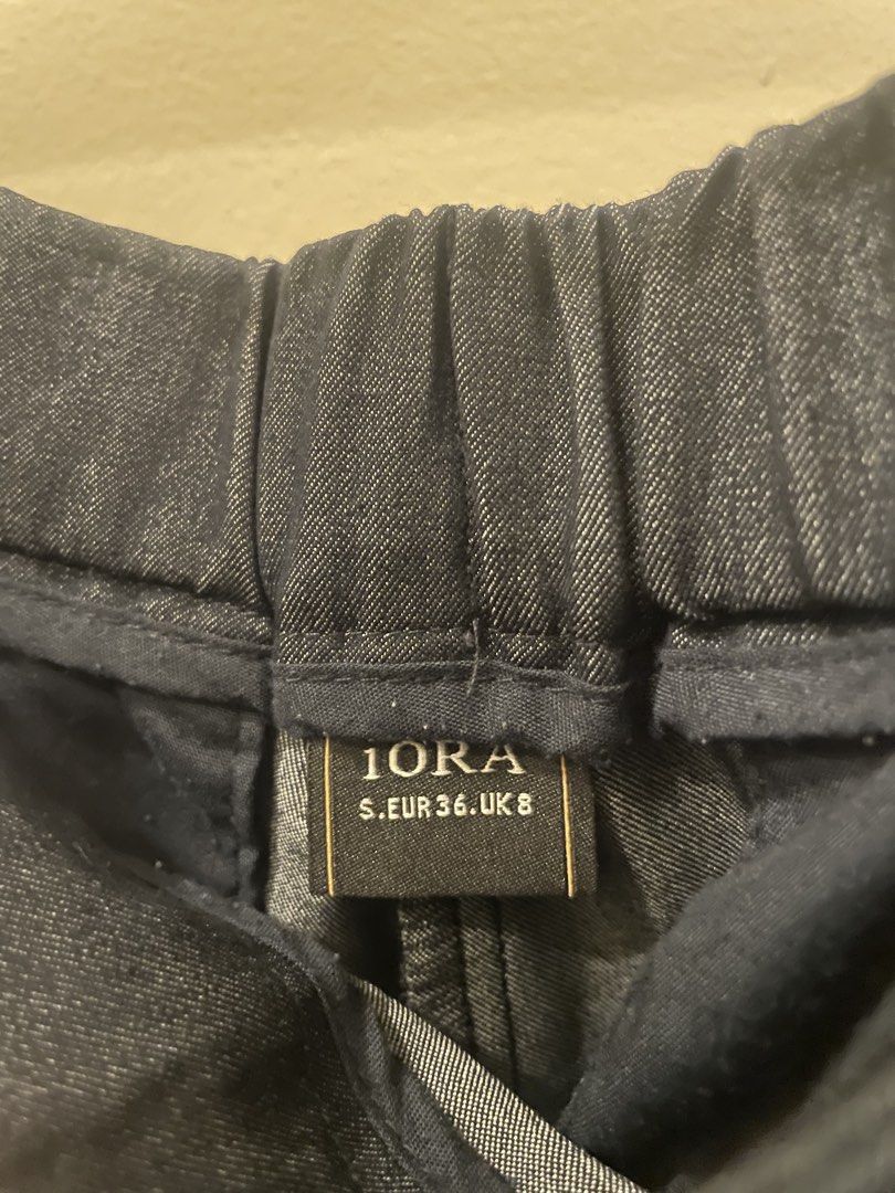 10RA Dark Wash Denim Shorts (Category: Shorts) located in Cordon. Submitted by secondgreatt (Listing ID 1450961046, Image 2). Description: - Brand: 10RA - Style: Dark wash denim shorts - Features: Elastic waistband for comfort - Design: Pleated front detail - Pockets: Front pockets included - Occasion: Great for casual wear - Versatility: Easy to pair with various tops.