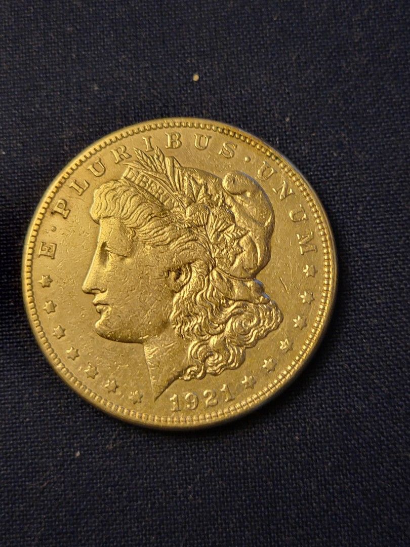 1921 s MORGAN SILVER DOLLAR (Category: Currency) located in Caloocan City. Submitted by swiftfish.d72520 (Listing ID 1435649590, Image 1). Description: 1921 s MORGAN SILVER DOLLAR. IN EXCELLENT GRADE. MINT STATE GRADE. LAST YEAR OF THE MORGAN DOLLAR SERIES. IN A PROTECTIVE CAPSULE. CASH ONLY WILL MEET. MAILING IS NOT AVAILABLE FOR THIS ITEM. PICK UP ONLY. THE GOLD COLOR IS THE LIGHTING EFFECT WHEN THIS WAS TAKEN. Contact #09681109587 Good luck.