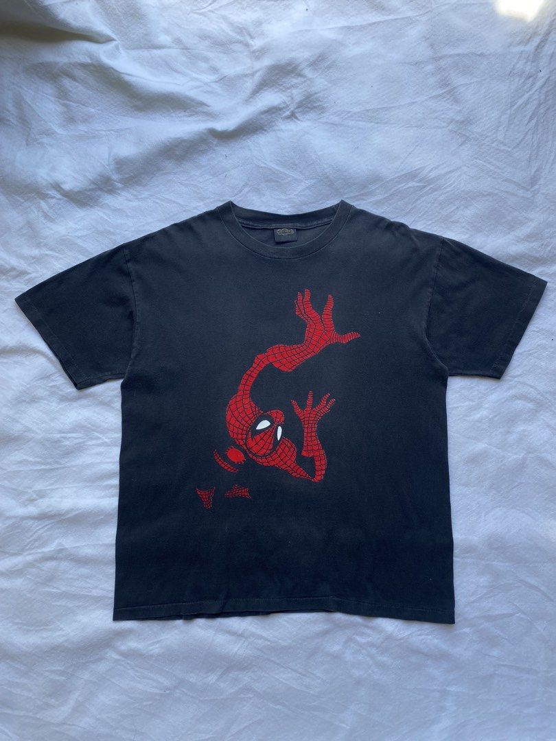 90s vintage Spider-Man marvel comics (Category: Tshirts & Polo Shirts ) located in Dasmarinas. Submitted by ridgeridethrift (Listing ID 1451114207, Image 2). Description: This vintage 1990s Spider-Man Marvel Comics shirt features a distinct flocked graphic on a black cotton tee. Vintage 1990s Spider-Man Marvels Comics shirt Often Found with Changes tag Measurements: Width Chest - 23 Length Top to Bottom -28 Item Description: 5000 + shipping fee D