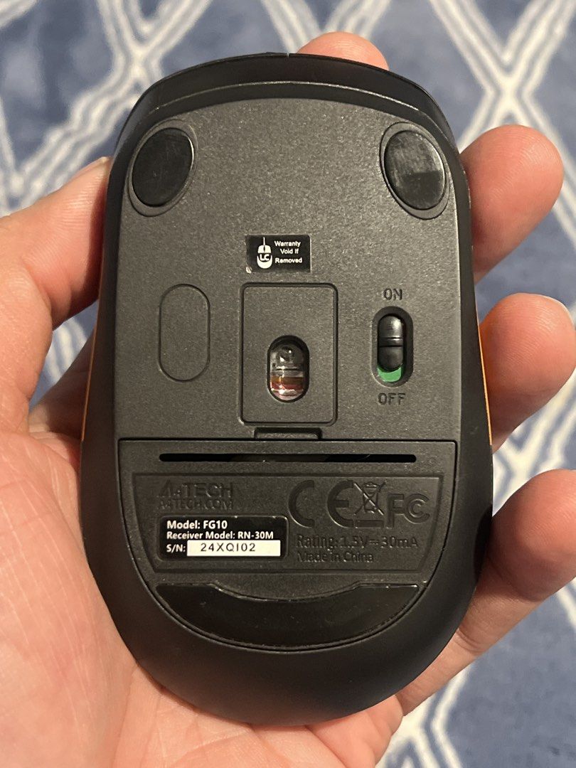A4TECH F5TYLER Wireless Optical Mouse (Category: Mouse & Mousepads) located in San Mateo. Submitted by patrickreyes003 (Listing ID 1451051121, Image 2). Description: - A4TECH FG10 Wireless Optical Mouse - Model: FG10 - Receiver: RN-30M - Color: Orange and Black - Power: 1 AA Battery - Features: Scroll wheel, 2 buttons - Condition: Works well.