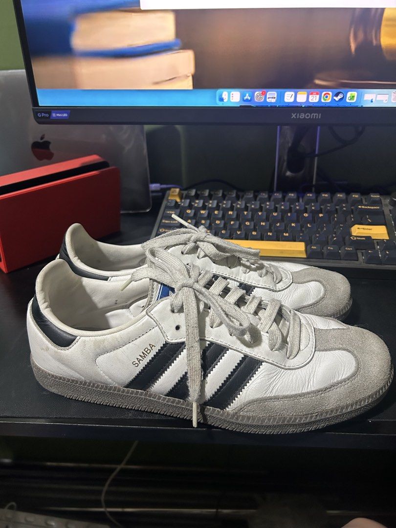 Adidas Samba OG White Black Leather Sneakers (Category: Sneakers) located in Quezon City. Submitted by dicgrayson (Listing ID 1451007889, Image 1). Description: - Classic Adidas Samba OG sneakers - White leather with black stripes - Grey suede toe cap - Perfect for casual wear - Shows some signs of wear, but plenty of life left - Iconic and stylish kicks.