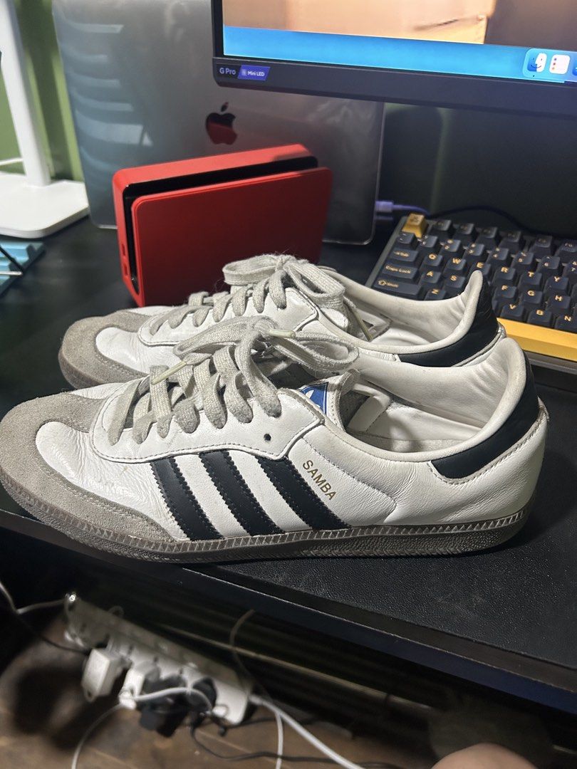 Adidas Samba OG White Black Leather Sneakers (Category: Sneakers) located in Quezon City. Submitted by dicgrayson (Listing ID 1451007889, Image 3). Description: - Classic Adidas Samba OG sneakers - White leather with black stripes - Grey suede toe cap - Perfect for casual wear - Shows some signs of wear, but plenty of life left - Iconic and stylish kicks.