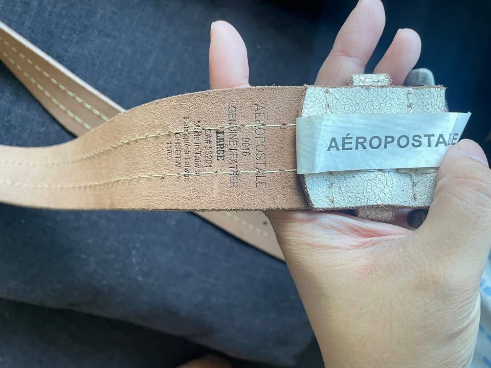 Aeropostale Genuine Leather Belt (Category: Belts) located in Cainta. Submitted by pnedp2022 (Listing ID 1450991073, Image 2). Description: - Aeropostale Belt - Genuine Leather - Length: 44 inches - Color: Light Beige/Off-White with Tan Stitching - Buckle: Silver-toned Metal - Condition: Excellent 9.5/10 - Loc: Greenwoods Pasig/Cainta.