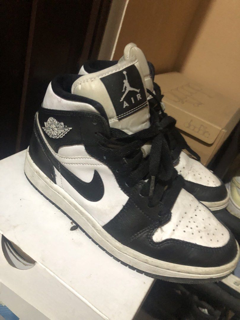 Air Jordan 1 Mid Black White Sneakers (Category: Sneakers) located in Quezon City. Submitted by markupapparel (Listing ID 1451070254, Image 3). Description: - Authentic Air Jordan 1 Mid sneakers - Classic black and white colorway - Mid-top silhouette - Black laces - Size: 6 (US Women's) - Includes original box.