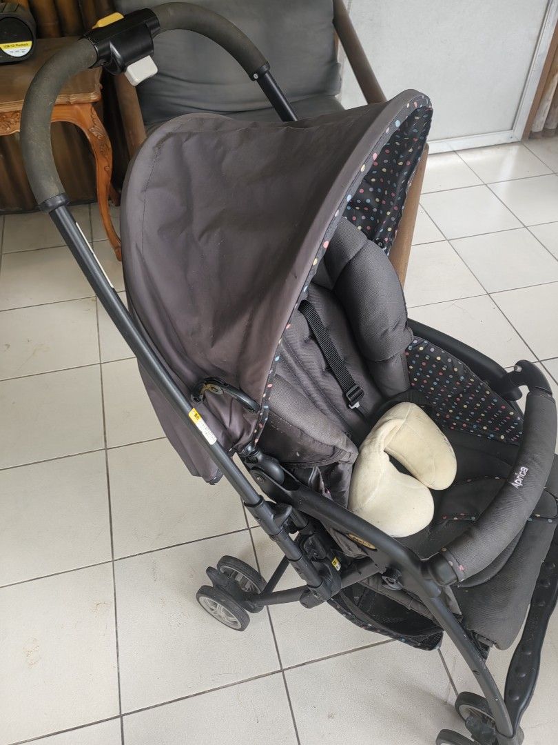 Aprica Stroller (Category: Strollers) located in Paranaque City. Submitted by gingerthecat1111 (Listing ID 1450943661, Image 3). Description: - Aprica stroller in black with a cute polka dot lining. - Easily folds for convenient storage. - All wheels are functional for smooth mobility - Ideal for navigating with your little one..