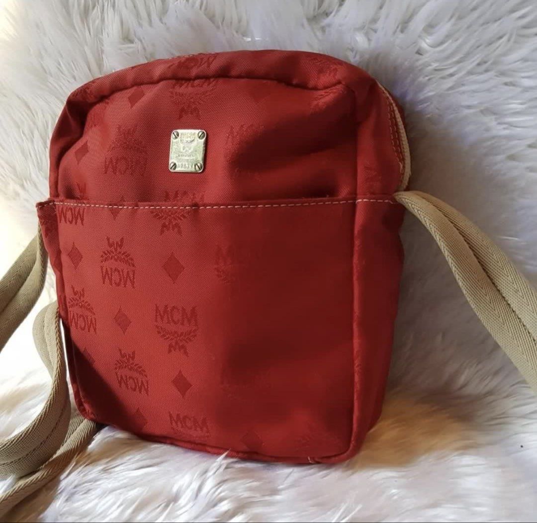 Authentic Preloved MCM Crossbody Bag (Category: Luxury Bags & Wallets) located in Baguio. Submitted by designerbin.ph (Listing ID 1451087626, Image 3). Description: Authentic Preloved MCM Crossbody Bag 6500 Made in Italy Condition: Very good condition. Rank: 8/10. Signs of normal use. Tolerable dirt on exterior and interior visible in close inspection. Scratches on hardware. Inclusion/s: None Authenticity: Money back if proven fake.