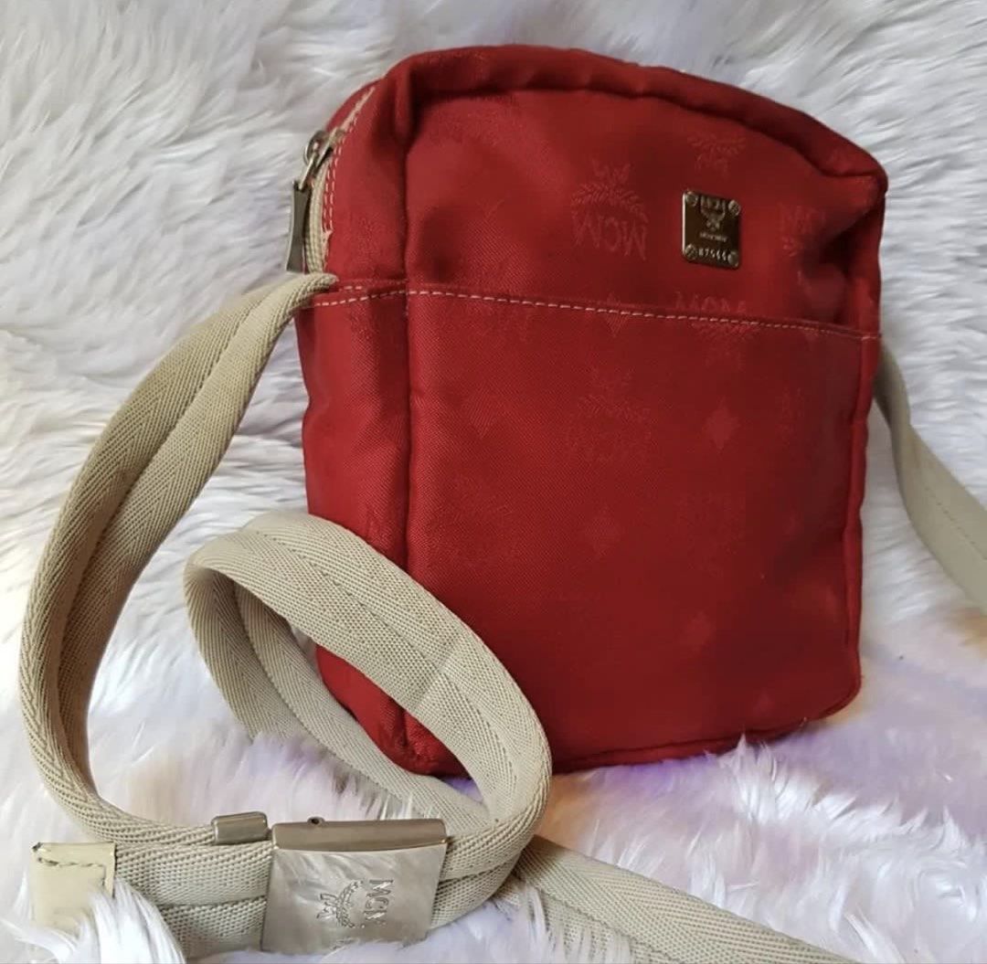 Authentic Preloved MCM Crossbody Bag (Category: Luxury Bags & Wallets) located in Baguio. Submitted by designerbin.ph (Listing ID 1451087626, Image 2). Description: Authentic Preloved MCM Crossbody Bag 6500 Made in Italy Condition: Very good condition. Rank: 8/10. Signs of normal use. Tolerable dirt on exterior and interior visible in close inspection. Scratches on hardware. Inclusion/s: None Authenticity: Money back if proven fake.