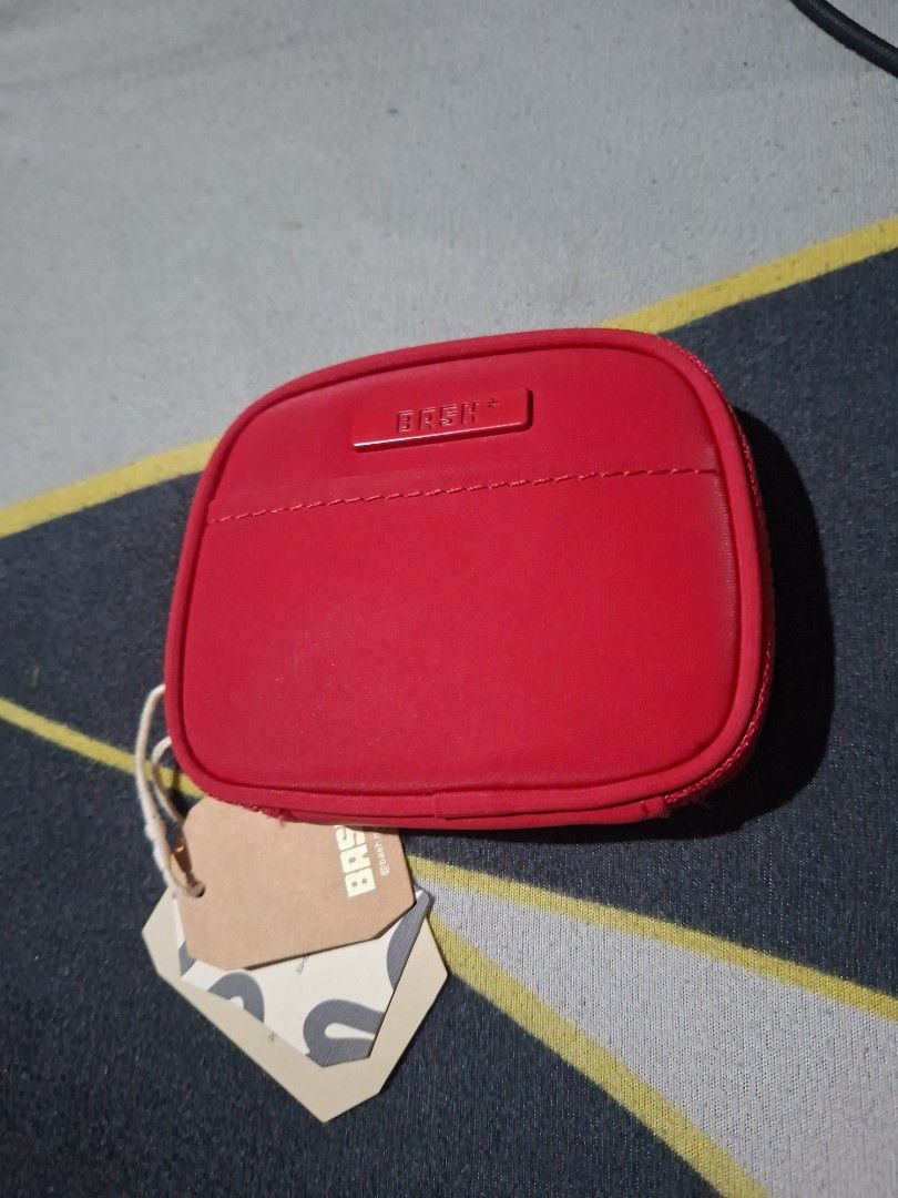 BASH Essentials Cardholder (Limited Edition) Chinese New Year (Category: Wallets & Card holders) located in Manila. Submitted by singlepringle (Listing ID 1451066773, Image 2). Description: - Brand: BASH+ - Color: Red - Type: Zippered Pouch - Size: Small and compact - Closure: Zipper - Condition: Brand new with original tags attached - Use: Ideal for organizing small items.