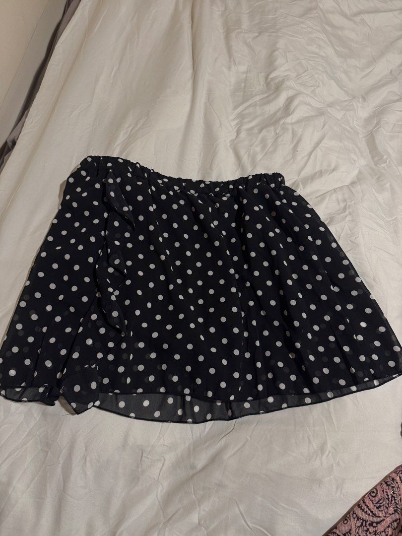 Black and White Polka Dot Skirt (Category: Skirts) located in Ormoc. Submitted by dan_monn (Listing ID 1450978002, Image 1). Description: - Cute black skirt with white polka dots - Comfortable elastic waistband - Lightweight material, ideal for warm weather - Flowy A-line silhouette - Versatile for casual or dressed-up looks.