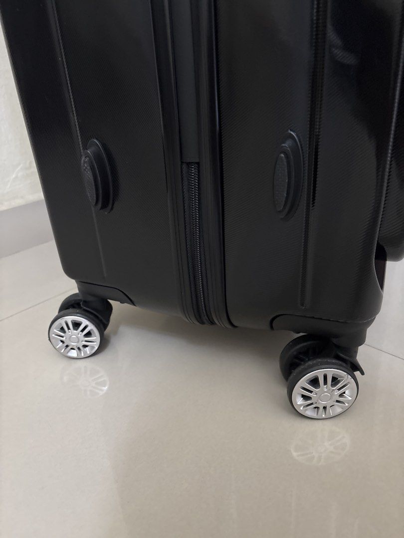 Black Hardshell Spinner Luggage with TSA Lock (Category: Luggages) located in Kuala Lumpur. Submitted by rareflower.1be926 (Listing ID 1451024446, Image 2). Description: - Durable black hardshell spinner luggage - Secure TSA-approved combination lock - Effortless maneuverability with smooth spinner wheels - Stylish textured finish - Ample interior space for all your travel needs - Perfect for your next getaway!.
