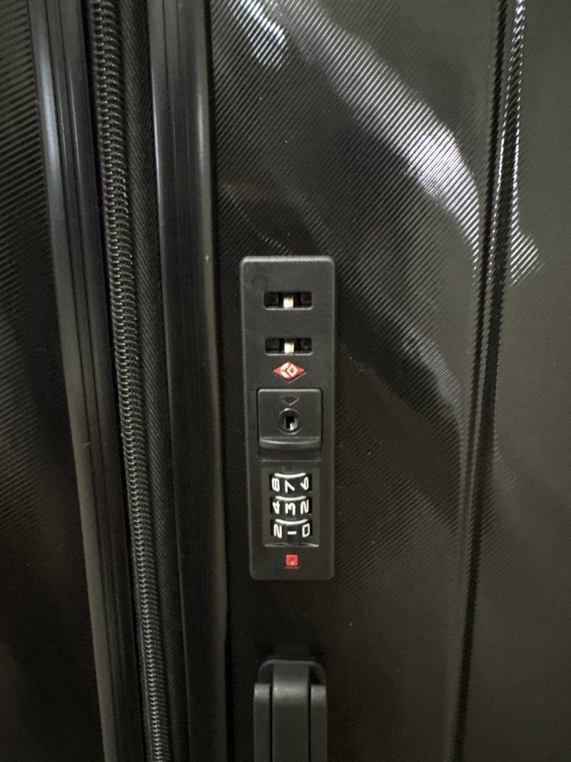 Black Hardshell Spinner Luggage with TSA Lock (Category: Luggages) located in Kuala Lumpur. Submitted by rareflower.1be926 (Listing ID 1451024446, Image 3). Description: - Durable black hardshell spinner luggage - Secure TSA-approved combination lock - Effortless maneuverability with smooth spinner wheels - Stylish textured finish - Ample interior space for all your travel needs - Perfect for your next getaway!.
